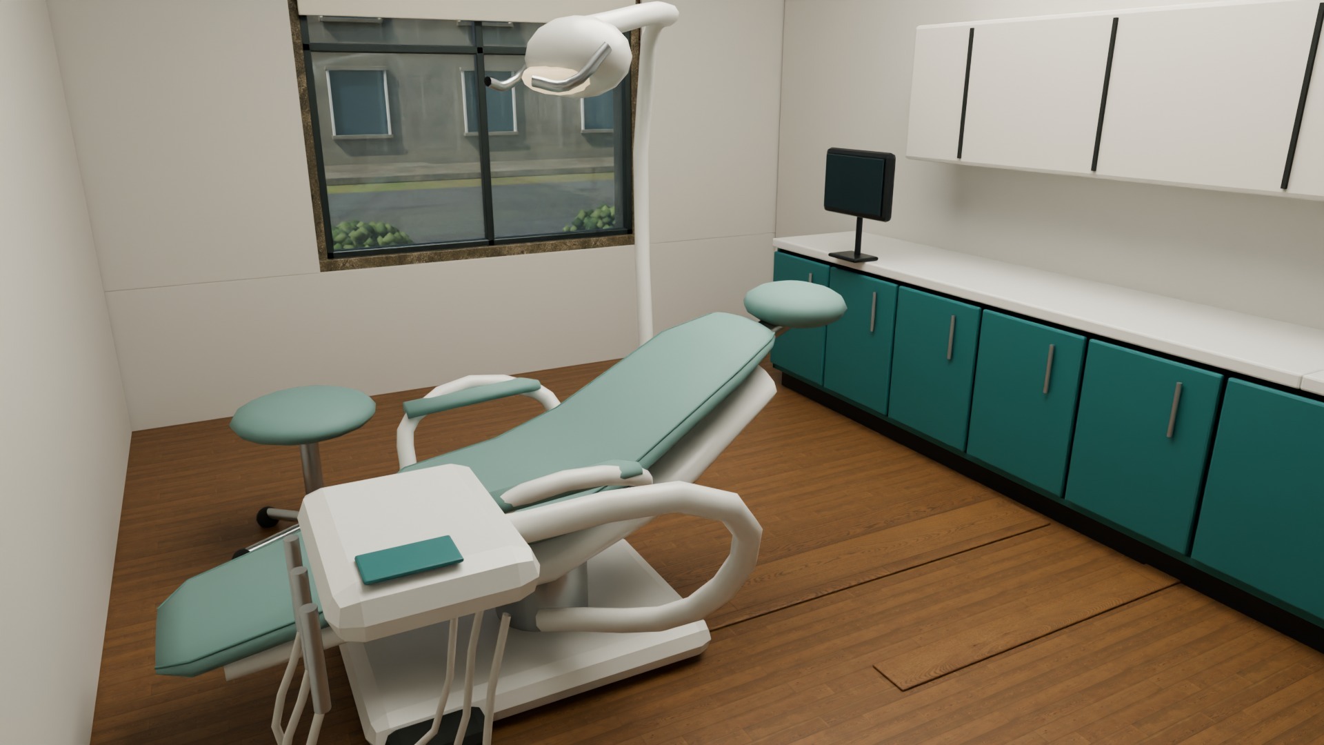 Sage upholstered dental chair, teal casework and a large recessed window in a finished treatment room