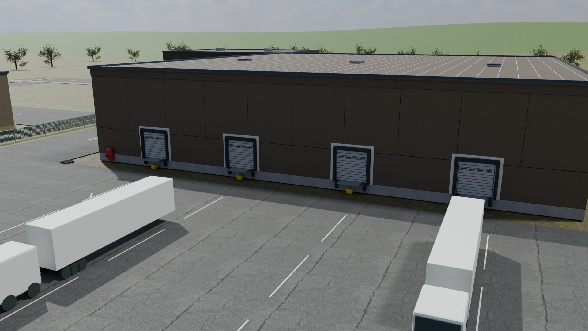 Four dock doors with dock equipment and trailer approach space at the rear of Kestervale Works.